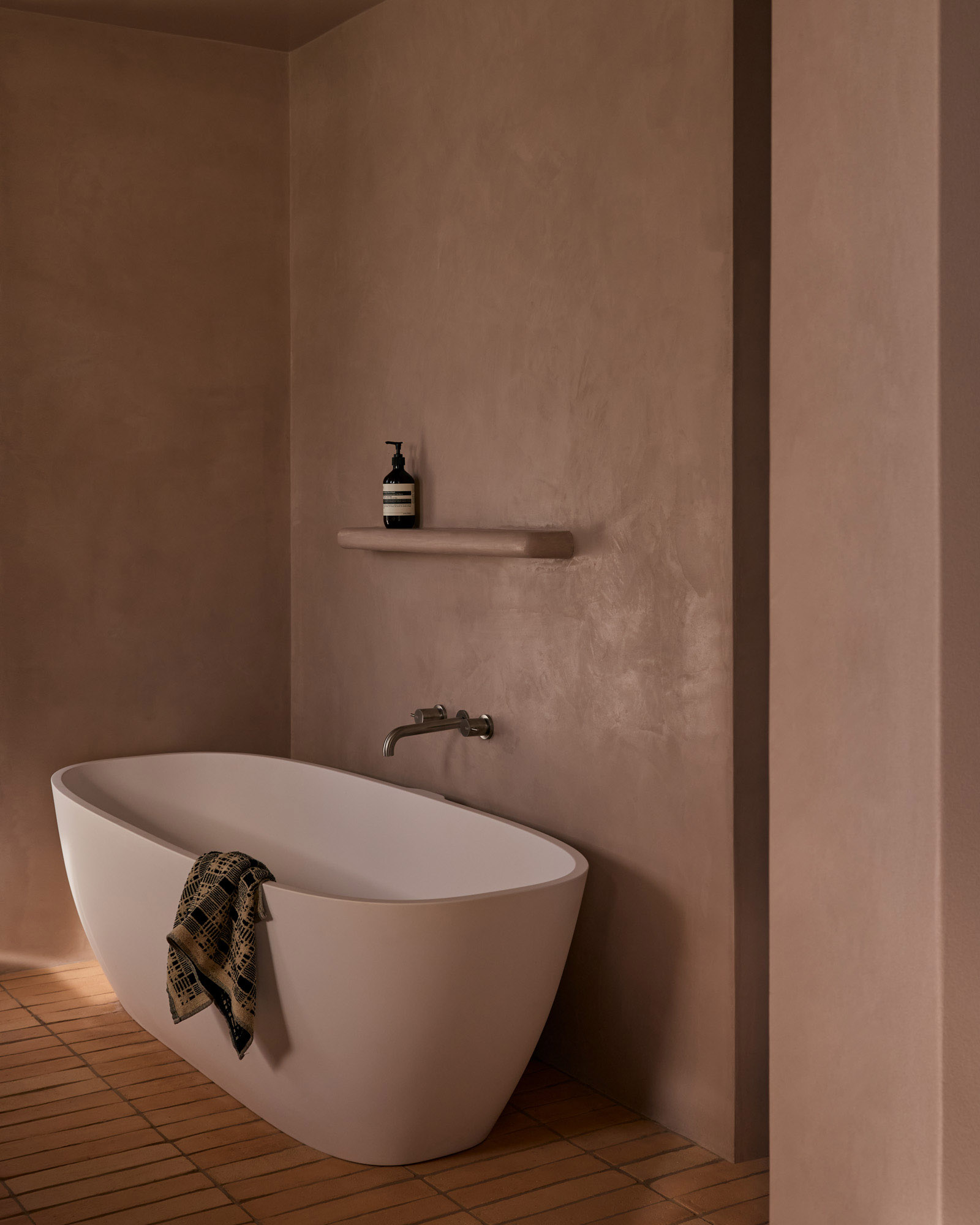 Little Cove bathroom featuring an Agape Normal Bath by Georgina Jeffries, photography by Lillie Thompson