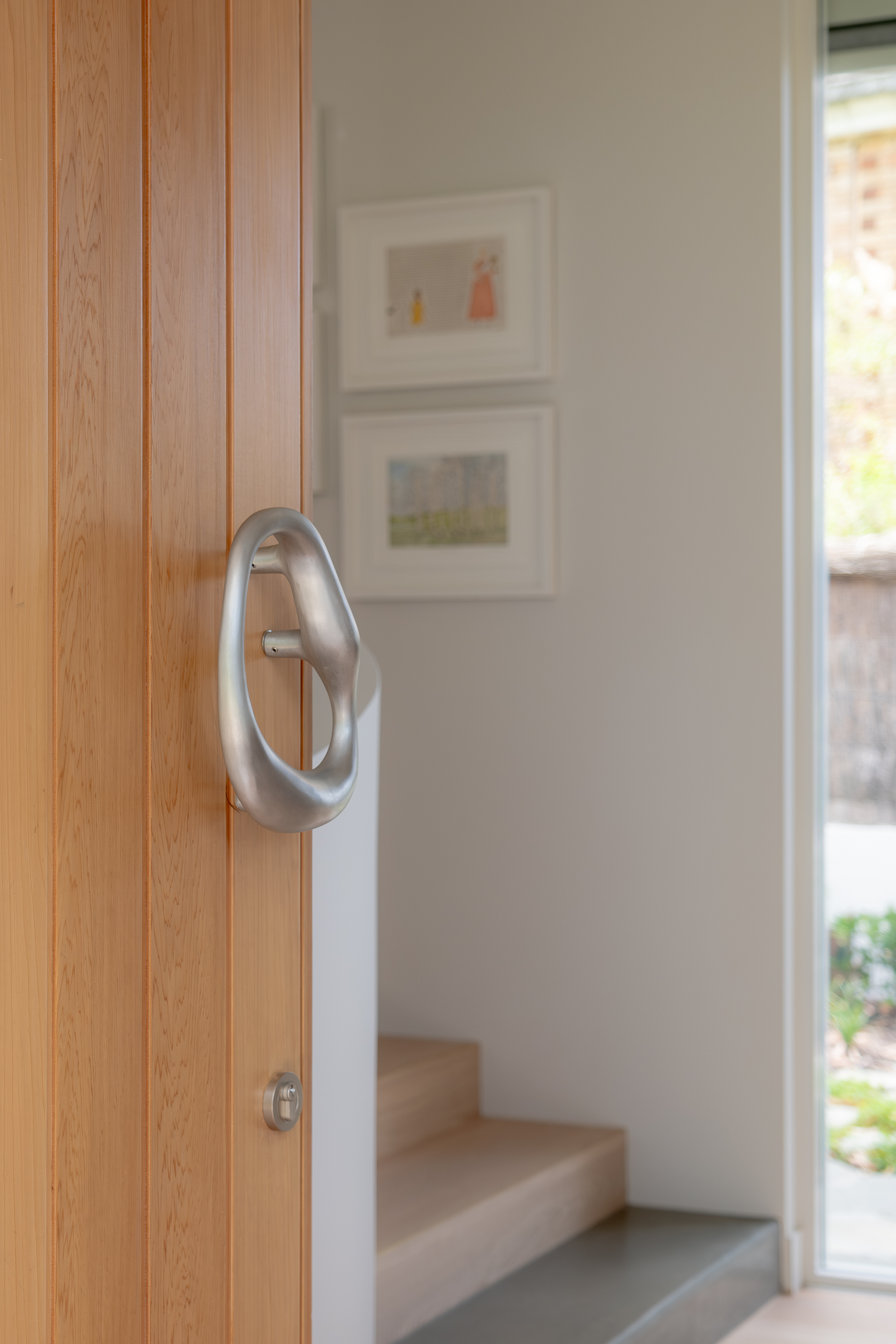 Amoeba door handle by Philip Watts Design, featured in Go House by Proske Architects, photography by Alexander Miller.