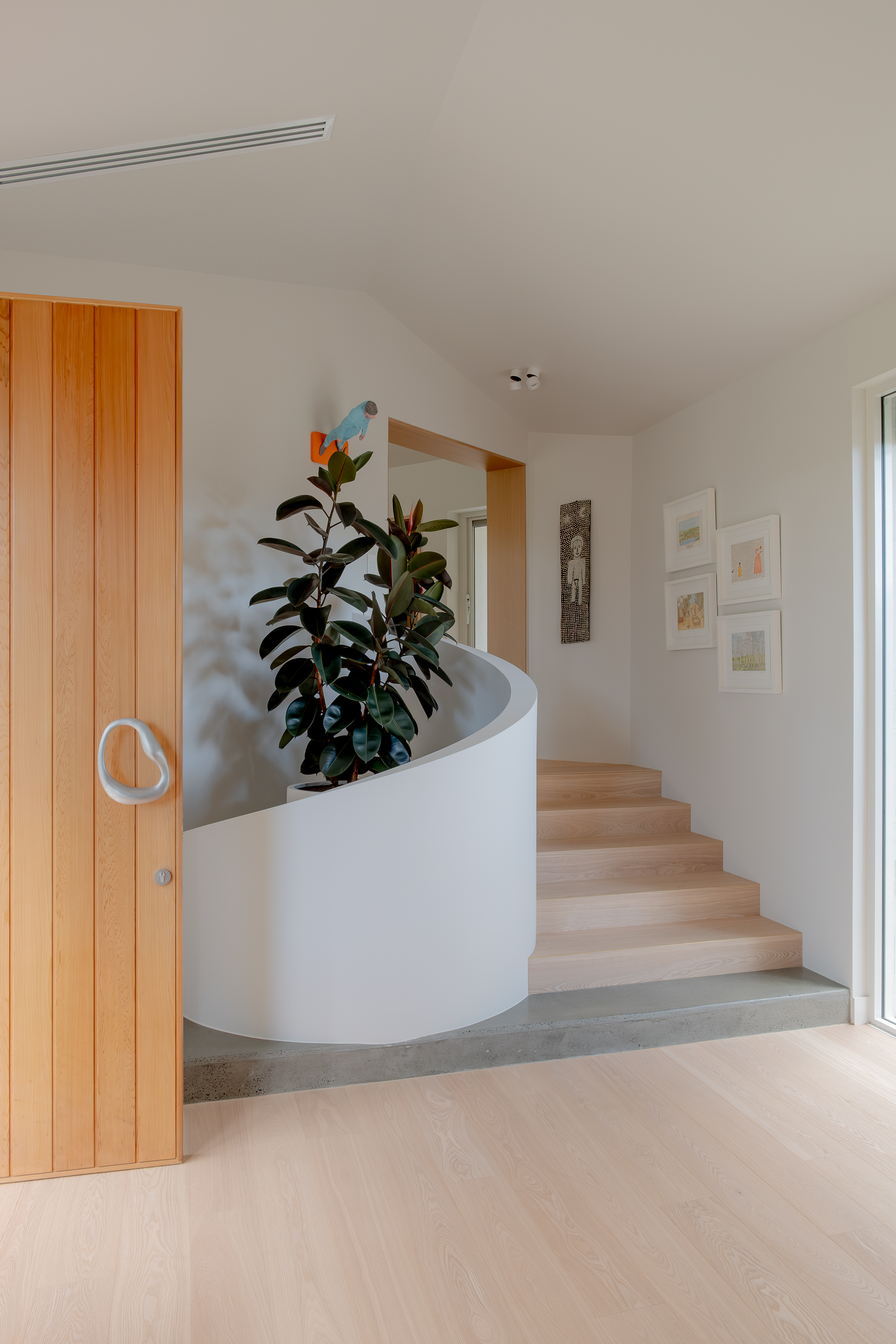 Amoeba door handle by Philip Watts Design, featured in Go House by Proske Architects, photography by Alexander Miller.